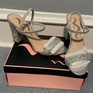 Woman’s sparkly heels